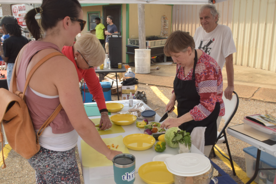 A cooking demonstration from a member of the community