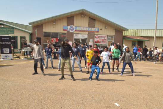 A local instructor from Griot Arts leads a dance lesson